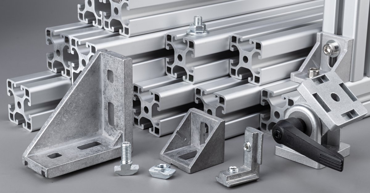 Various aluminum extrusion profile bars with different accessories. Each one has a different shape in the material.